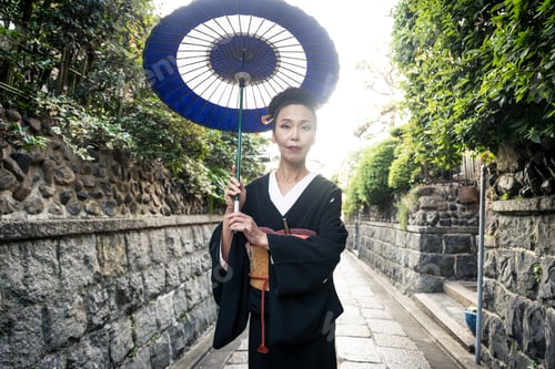 Preview: Asian woman with yukata walking in Kyoto, Japan