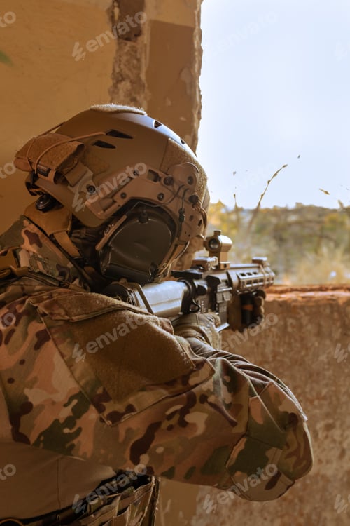 Preview: Man wearing a military uniform with a rifle