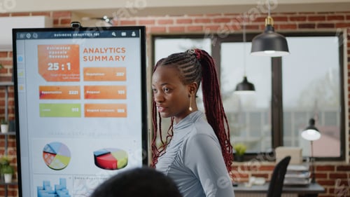 Preview: Close up of african american woman presenting marketing strategy