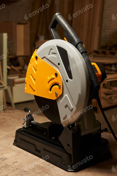 Preview: close-up of a new cutting off abrasive disc machine standing in a carpentry workshop surrounded by
