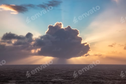 Preview: Dramatic Colorful Sunrise Sky over North Atlantic Ocean. Cloudscape Nature Background