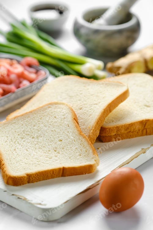 Preview: Close-up view of bread for toasts and ingredients