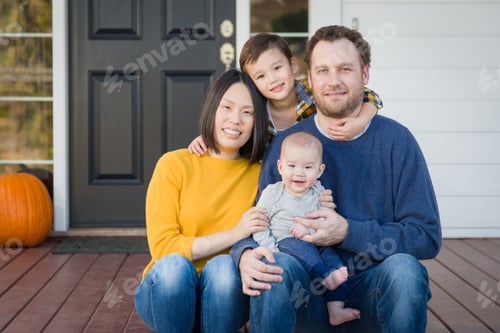 Preview: Young Mixed Race Chinese and Caucasian Family Portrait On Their Front Porch.