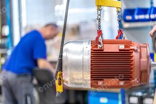 Preview: electric motor hung on the production line in the factory