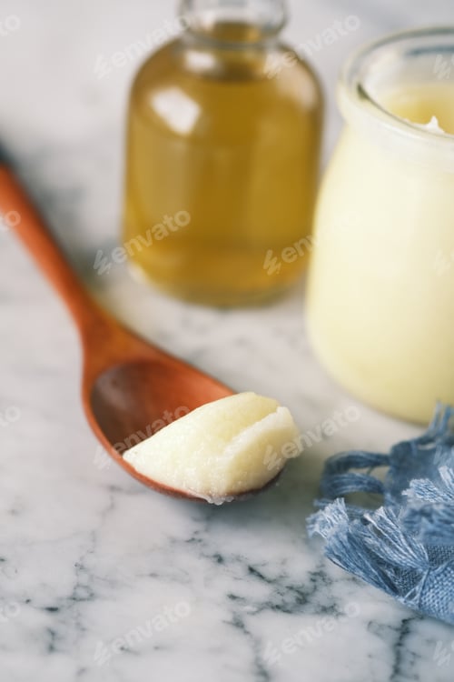 Preview: homemade ghee in container on a table ,