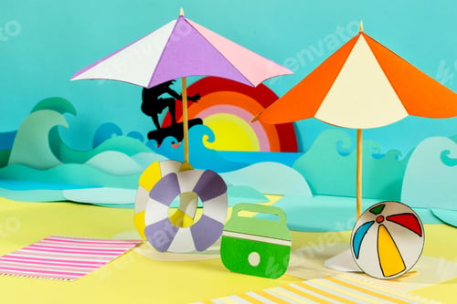 Preview: Creative paper craft of a surfer on the waves and a sandy beach