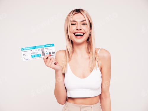 Preview: Young beautiful blond woman posing in studio