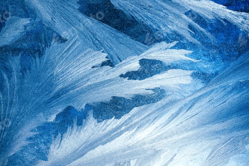 Preview: Contrast frosty pattern on the window, abstract winter background.