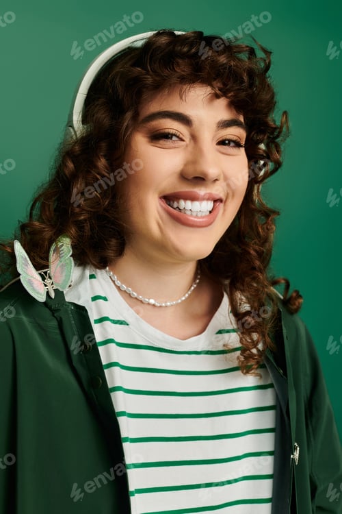 Preview: Stylish young woman radiating emotion with a bright smile in a trendy outfit