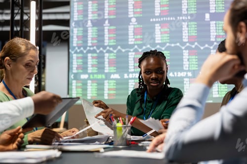 Preview: Diverse firm associates review success and efficiency metrics within enterprise