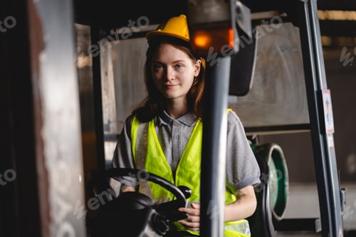Preview: professional Female worker driving forklift in industrial, storehouse or warehouse container