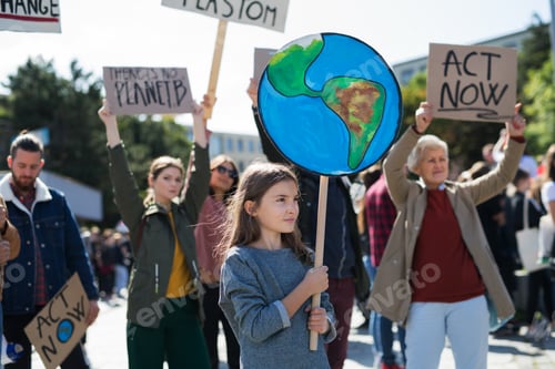 Preview: People with placards and posters on global strike for climate change