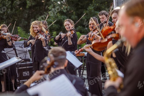 Preview: Violin players playing classic instrumental music on the street
