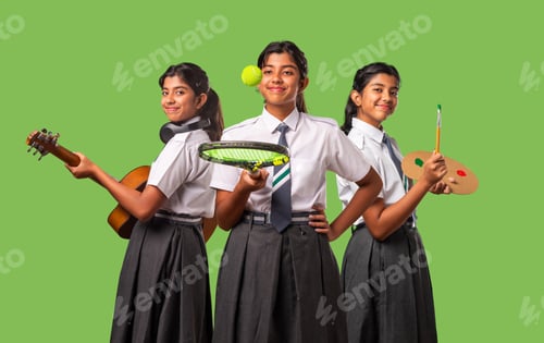 Preview: Indian asian schoolgirl in school uniform and career concept