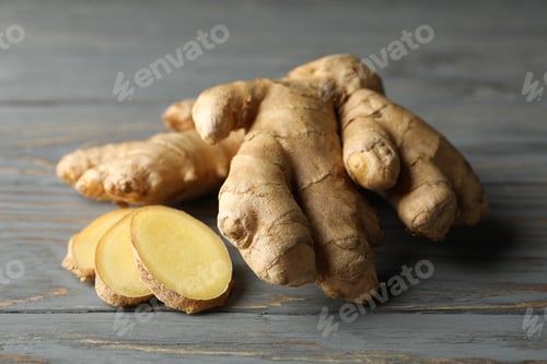 Preview: Fresh ginger on wooden background, close up