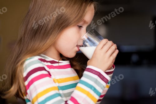 Preview: Girl drinking milk