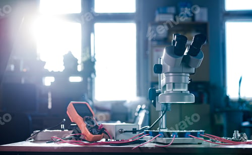 Preview: Modern microscope, connectors component and large green microcircuit in workshop laboratory