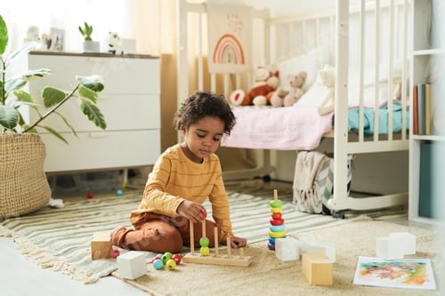 Preview: Playing with Educational Toys in Child's Bright Room