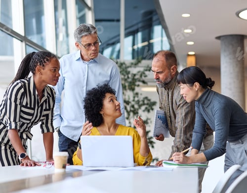 Preview: Group of young business people having a meeting in the office