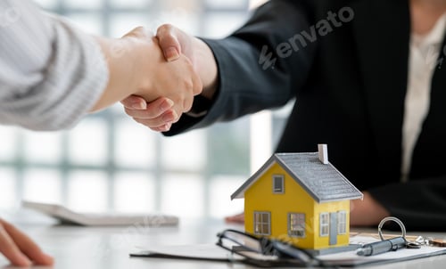 Preview: Close up handshake, Considering buying a home, investing in real estate.