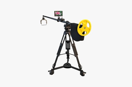 Preview: Camera on wheeled tripod with film reel and bag