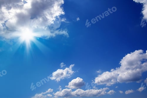 Preview: Blue Sky with White Clouds and Sunlight