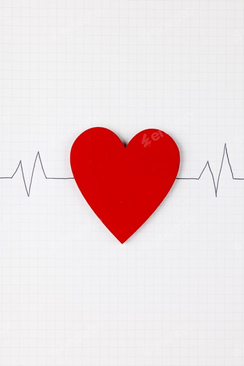 Preview: Vertical image of red heart and heart rate on white surface