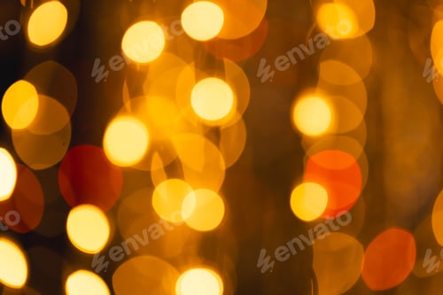 Preview: Yellow bokeh lights with copy space on dark background