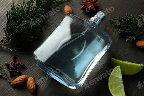 Preview: Composition with bottle of male perfume, close up