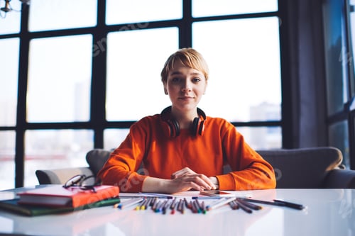 Preview: Designer working on new creative project sitting at table