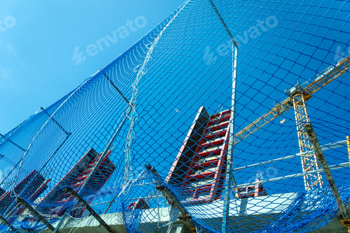 Preview: Protection net in a masonry worksite in the construction of the pillars of an building