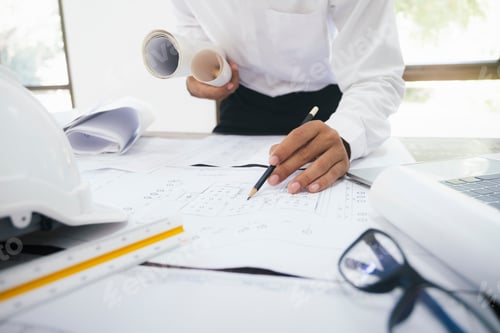 Preview: Architect or engineer working in office