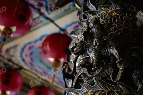 Preview: Intricate Asian temple decor with red lanterns.