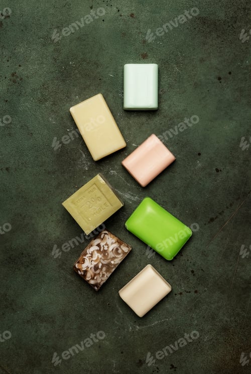 Preview: Barst of toilet moisturizing soap on green background, op view