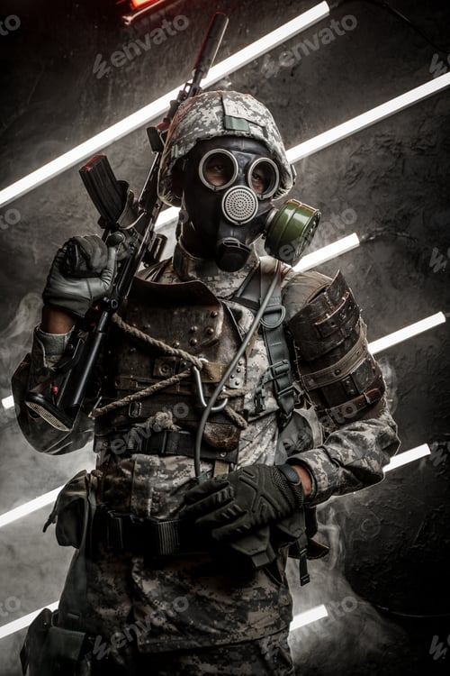 Preview: Military man with gas mask holding rifle on his shoulder