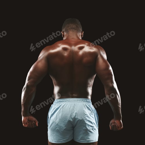 Preview: African american sportsman showing strong back muscles