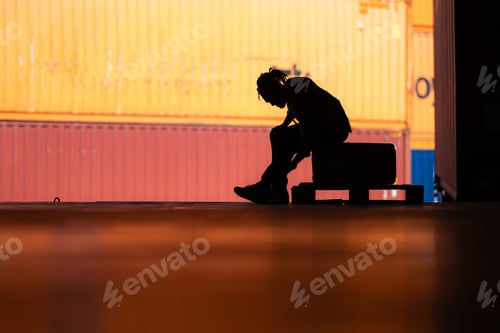 Preview: Warehouse worker's back pain from hard work while sitting and relaxing, Silhouette concept
