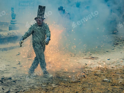 Preview: Ibi, Spain - December, 28 2018: People celebrating victory in flour and eggs battle