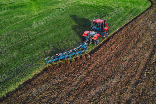 Preview: Aerial View of Tractor Plowing Field