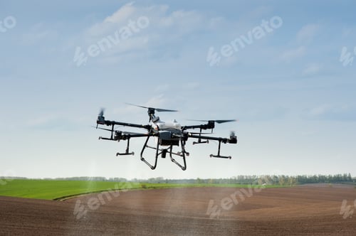 Preview: Drone Flying Over Agricultural Field in the Daytime