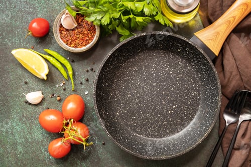 Preview: Food cooking background with Frying pan. Empty skillet, vegetables, spices and herbs.