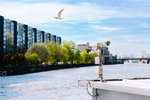 Preview: River View With Boat And City Buildings