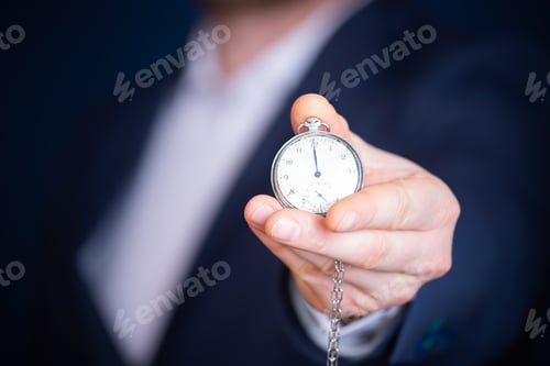 Preview: Businessman with clock in time concept