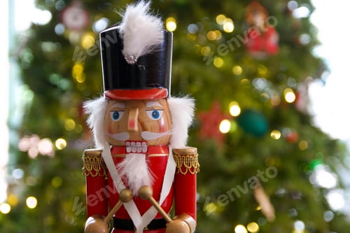 Preview: Drummer soldier nutcracker with Christmas tree bokeh in background