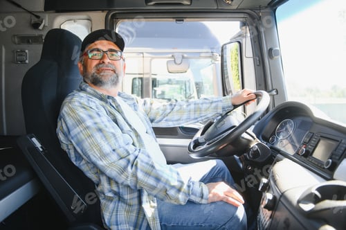 Preview: Professional Semi Truck Driver Behind the Wheel of a Classic Truck