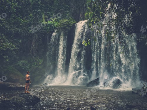 Preview: A man at the waterfall, Phnom Koulen at Siem Reap, Cambodia