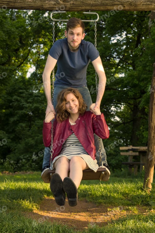 Preview: Girl Boy, Couple Swing , Looking At Camera.