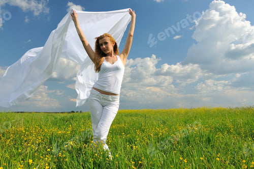 Preview: Woman in flower field with silk cloth in her hands