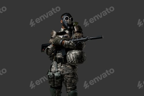 Preview: Modern soldier of african ethnic with rifle and gas mask