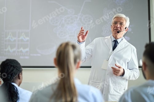 Preview: Senior Scientist Giving Presentation in Medical Classroom